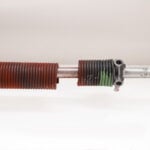 Garage Door Spring Replacement: Signs, Risks, and Professional Solutions