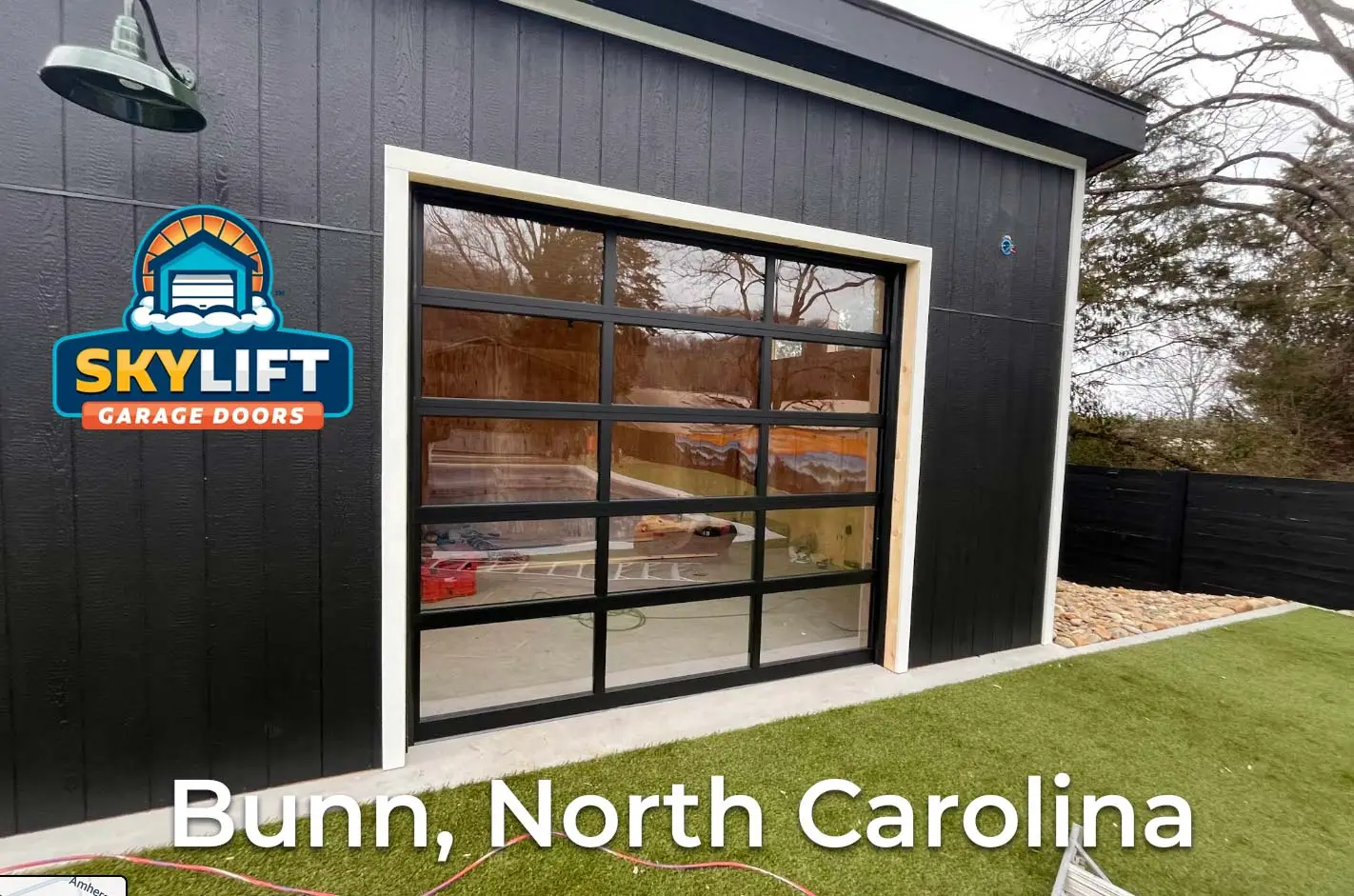 New done clean Clear glass garage door in Bunn, North Carolina