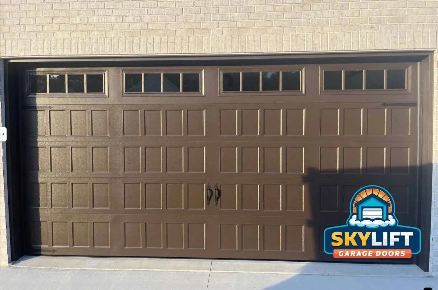 zebulon, nc - brown garage door w window inserts