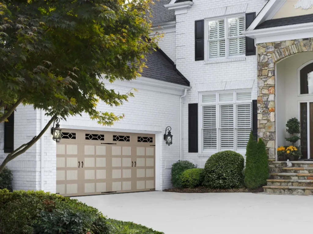 beige garage door with decorative windows