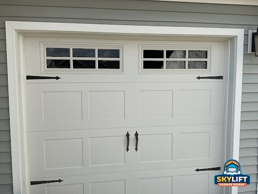 white garage door with window inserts, decorative hardaware