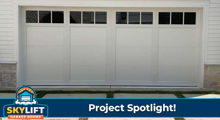 white paneled garage door with window inserts along top