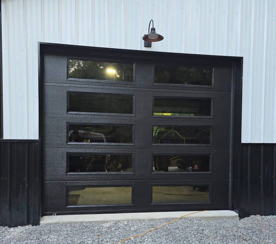black modern garage door with privacy windows